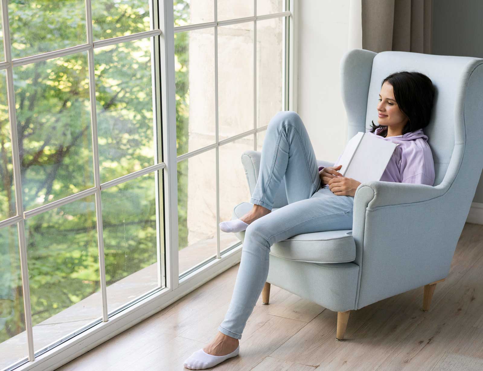 woman by window